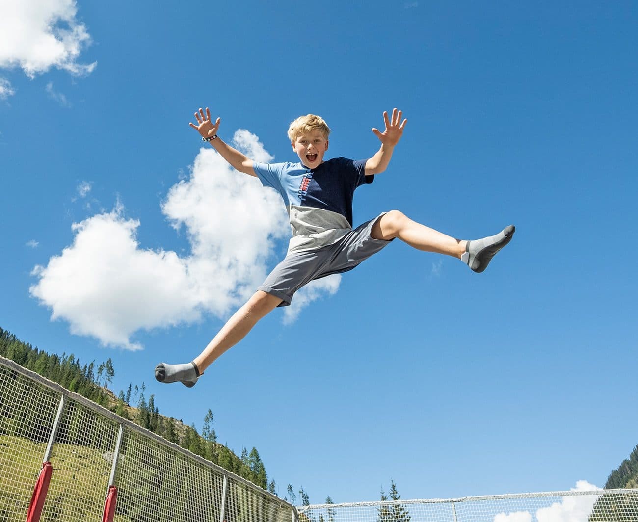 Jumping on a trampoline